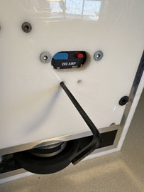 A black tool on a white surface

AI-generated content may be incorrect.
