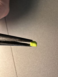 A close up of a tweezers

AI-generated content may be incorrect.