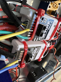 A close-up of several wires

AI-generated content may be incorrect.
