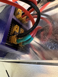 A close up of wires

AI-generated content may be incorrect.