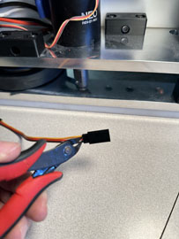 A hand holding a pair of pliers

AI-generated content may be incorrect.