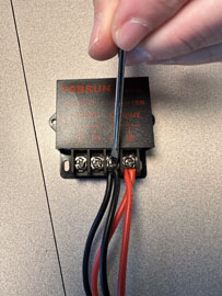 A hand holding a screwdriver

AI-generated content may be incorrect.