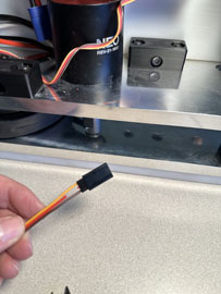A hand holding a wire

AI-generated content may be incorrect.